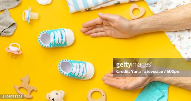 baby accessories for newborns on a colored background selective focus - baby accessories the dummy stock pictures, royalty-free photos & images