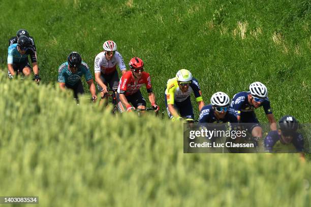 General view of Kenneth Vanbilsen of Belgium and Team Cofidis, Jasper De Buyst of Belgium and Team Lotto Soudal and the peloton competing during the...