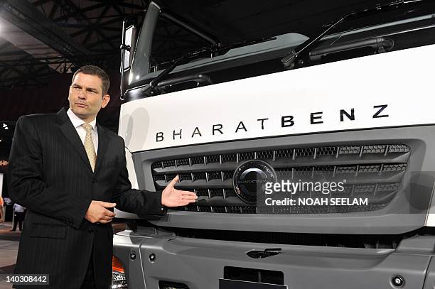 Managing Director and Chief Executive Officer of Daimler India Commercial Vehicles Private Limited , Marc Llistosella, poses at a press conference...