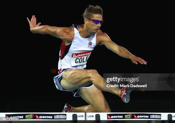 Brendan Cole of Australia on his way to an Olympic Qualifier in the 400 Metres Hurdles Open Men during day one of the Melbourne Track Classic/IAAF...