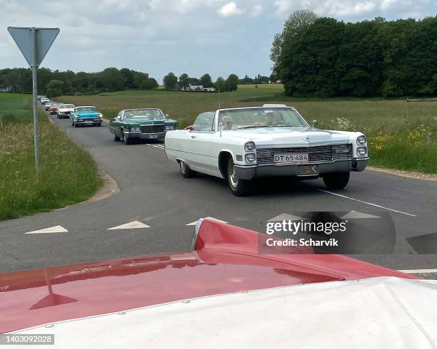 classic veteran cadillacs cruising danish roads - an american tail stock pictures, royalty-free photos & images