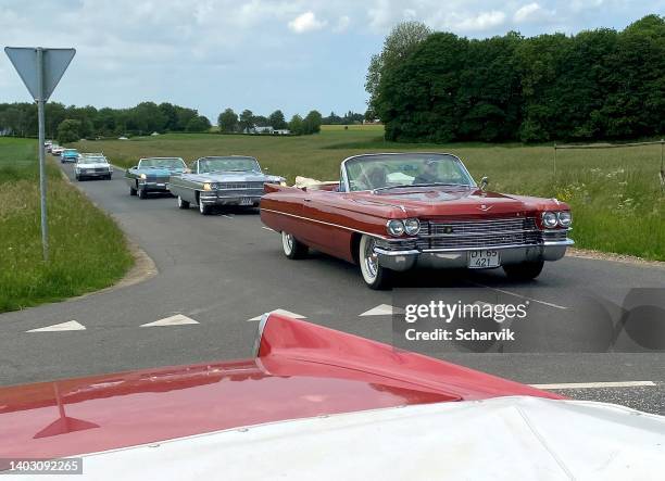 classic veteran cadillacs cruising danish roads - cadillac eldorado stock pictures, royalty-free photos & images