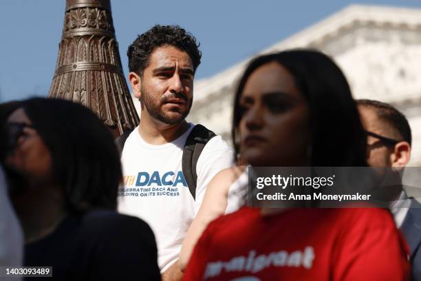 Activists listen during a news conference to mark the 10th anniversary of the "Deferred Action for Childhood Arrivals" at the U.S. Capitol on June...