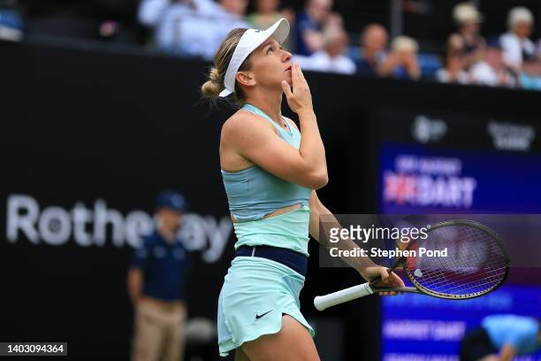 Simona Halep of Romania celebrates match point against Harriet Dart of Great Britain during the second round match on Day Five of the Rothesay...