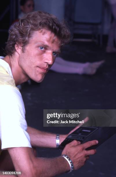 Danish choreographer Peter Martins directs members of the New York City Ballet during a rehearsal, New York, New York, August 1980.