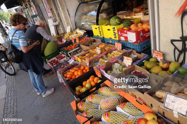 People peruse produce at a small grocery store on June 15, 2022 in Berlin, Germany. Inflation has skyrocketed in Germany since Russia's February...