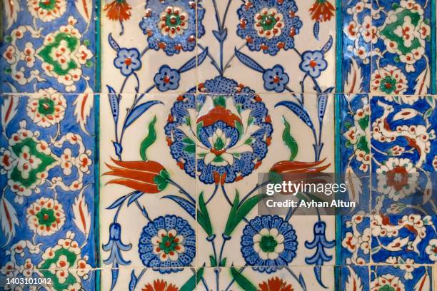 iznik tile inside the takkeci ibrahim aga mosque in zeytinburnu district of istanbul, turkey - mosque pattern stock pictures, royalty-free photos & images