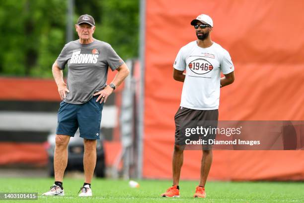 Managing and principal partner Jimmy Haslam of the Cleveland Browns talks with general manager Andrew Berry during the Cleveland Browns mandatory...