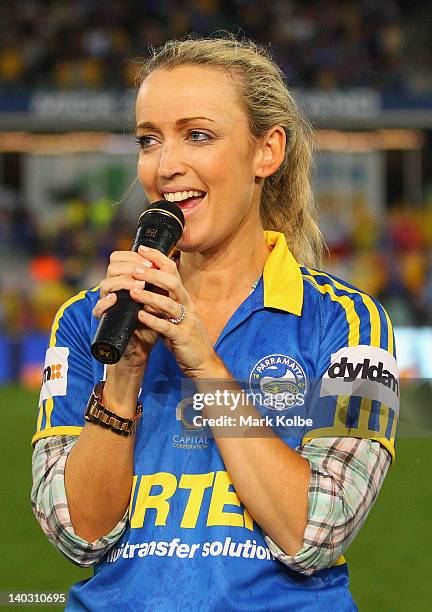 Radio host Jackie O sings the national anthem before the round one NRL match between the Parramatta Eels and the Brisbane Broncos at Parramatta...