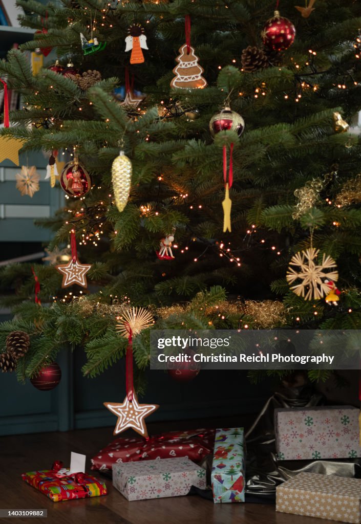 Many Christmas presents under Christmas Tree