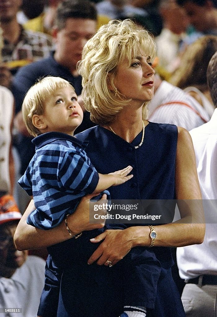 Cal Ripken Ryan Ripken Kelly Ripken holds son Ryan and watches husband Cal Ripken of the ...