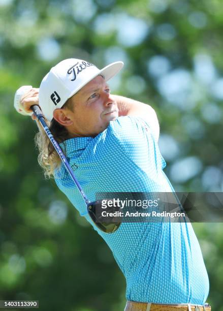 Cameron Smith of Australia plays his shot from the tenth tee during a practice round prior to the 122nd U.S. Open Championship at The Country Club on...