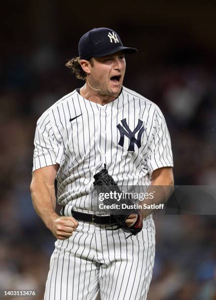 Gerrit Cole of the New York Yankees reacts after a double play to end the top of the sixth inning of the game against the Tampa Bay Rays at Yankee...