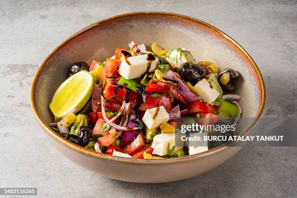 greek salad - black olive stock pictures, royalty-free photos & images