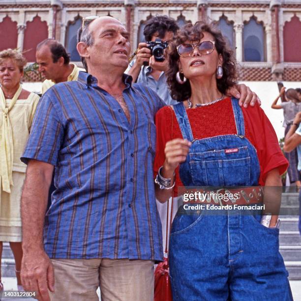 The Italian actress Claudia Cardinale at the Venice Film Festival with her husband, the film director Pasquale Squitieri. September 01, 1984.