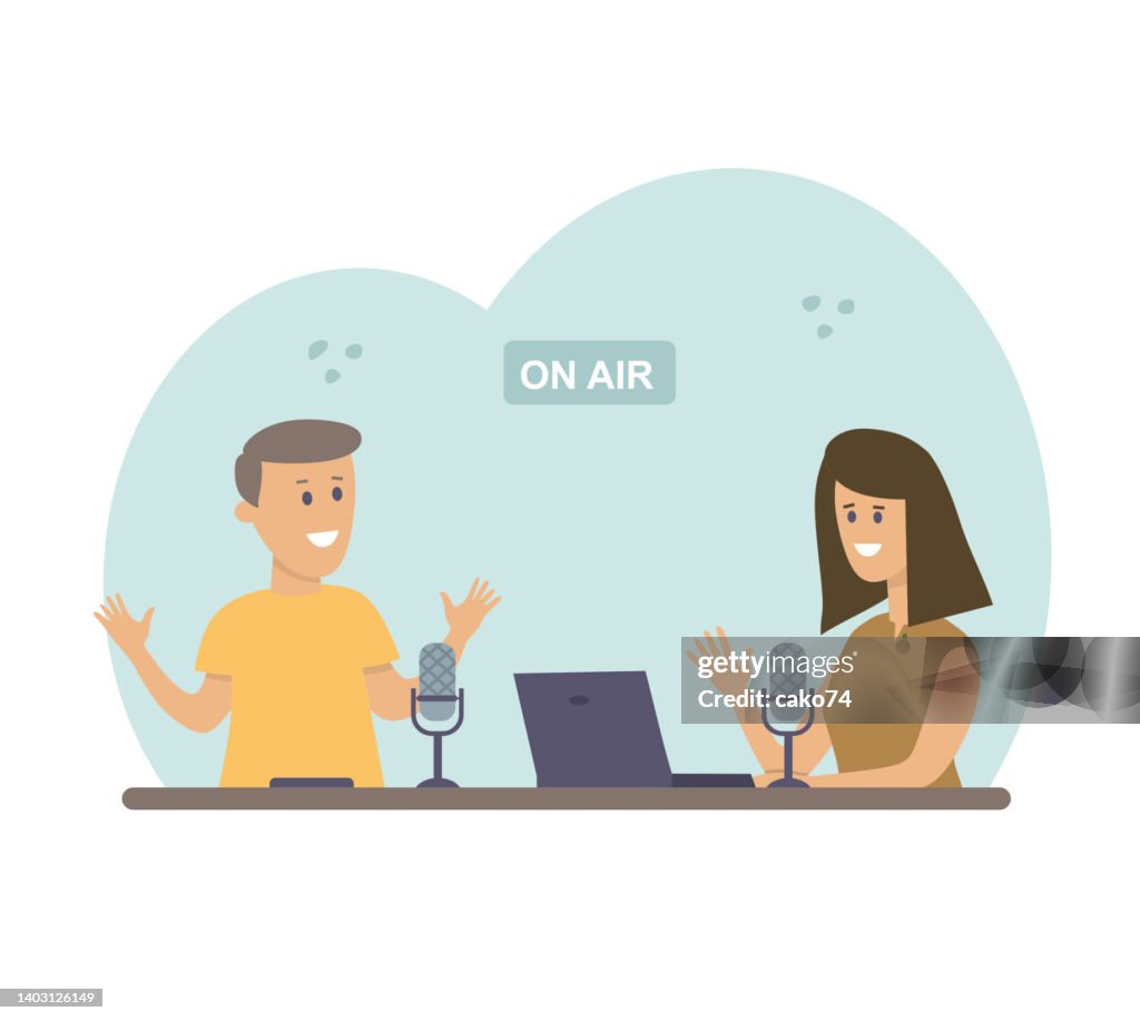 Man and woman recording podcast