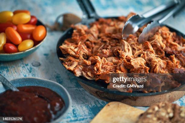 pulled chicken burger sandwich with radish and green salad served with french fries - pulled chicken stock pictures, royalty-free photos & images