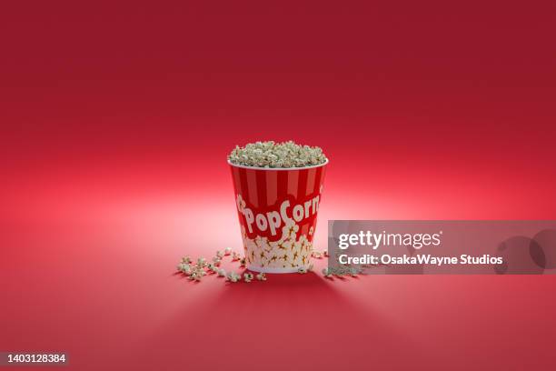 full bucket of popcorn, big portion of snack food - pop corn stock pictures, royalty-free photos & images