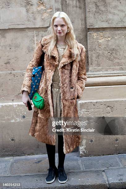 Chrystal Copland, Model wearing a Marc by Marc Jacobs Jacket bag, Marc Jacobs dress, vintage jacket and H and M shoes street style at Paris fashion...