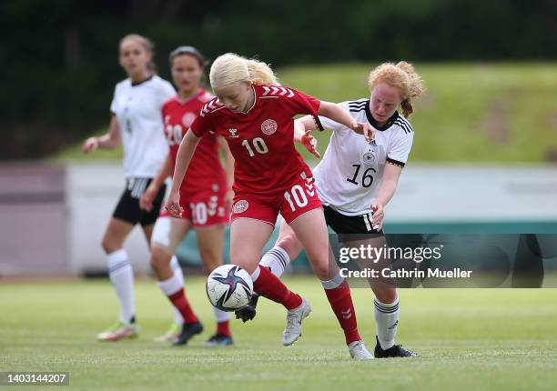 Elvira Nejmann of Denmark and Milena Roeder of Germany battle for the ball during the International Friendly match between Germany Women U16 and...