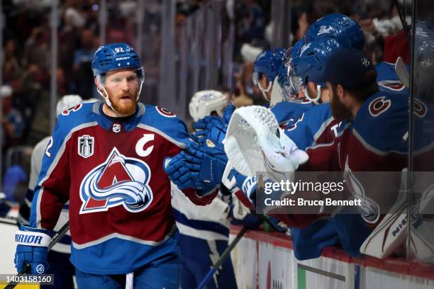 Gabriel Landeskog of the Colorado Avalanche celebrates with teammates after scoring a goal against the Tampa Bay Lightning during the first period in...