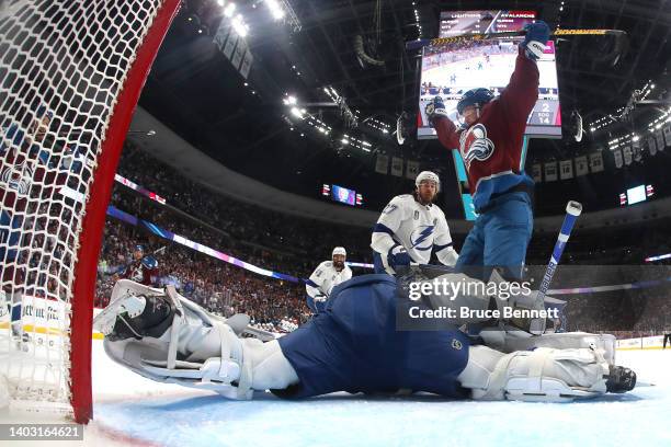 Artturi Lehkonen of the Colorado Avalanche scores a goal against Andrei Vasilevskiy of the Tampa Bay Lightning during the first period in Game One of...