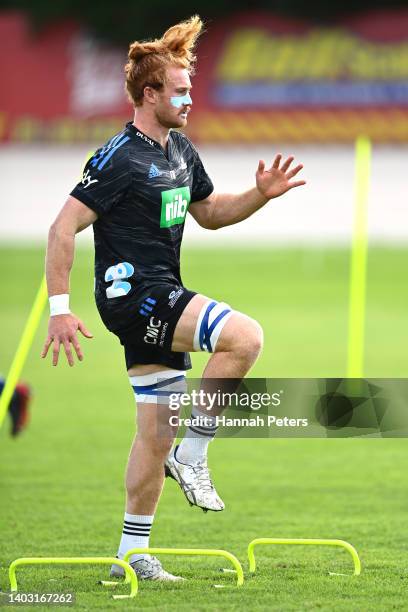 Tom Robinson warms up during a Blues Super Rugby Pacific training session at Blues HQ on June 16, 2022 in Auckland, New Zealand.