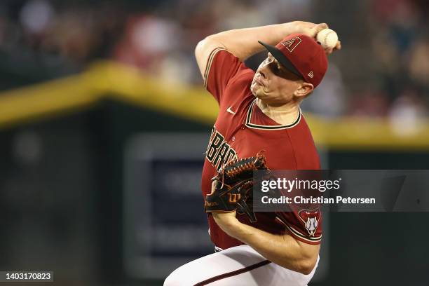 Relief pitcher Mark Melancon of the Arizona Diamondbacks pitches during the ninth inning of the MLB game against the Cincinnati Reds at Chase Field...