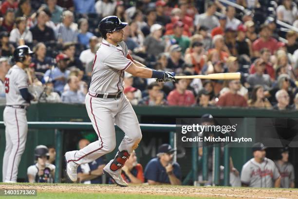 Austin Riley of the Atlanta Braves hits a two-run home run in the seventh inning during a baseball game against the Washington Nationals at Nationals...