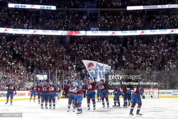 The Colorado Avalanche celebrate after Andre Burakovsky scored a goal in overtime to defeat the Tampa Bay Lightning 4-3 in Game One of the 2022...