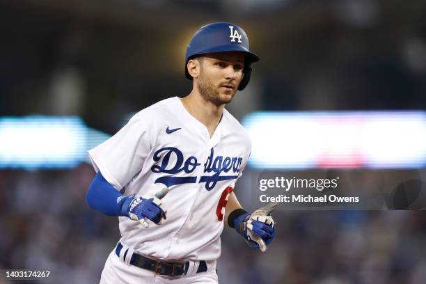 Trea Turner of the Los Angeles Dodgers celebrates as he rounds the bases after hitting a solo home run against the Los Angeles Angels during the...