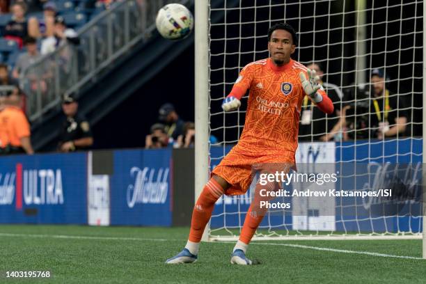 Pedro Gallese of Orlando City makes a save during a game between Orlando City SC and New England Revolution at Gillette Stadium on June 15, 2022 in...