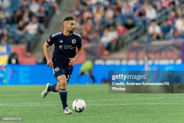 Sebastian Lletget of New England Revolution brings the ball forward during a game between Orlando City SC and New England Revolution at Gillette...