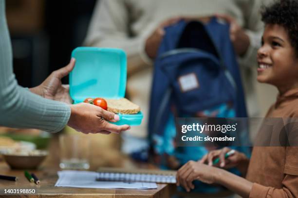 here's a sandwich for your school lunch sweetie! - african food stock pictures, royalty-free photos & images