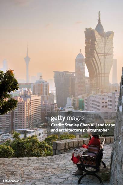 sitting alone in macau - macao fotografías e imágenes de stock
