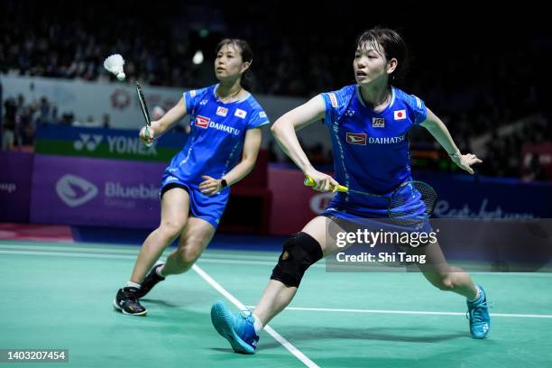 Yuki Fukushima and Sayaka Hirota of Japan compete in the Women's Doubles Second Round match against Pearly Tan and Thinaah Muralitharan of Malaysia...