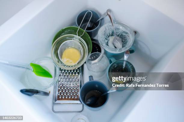 dirty dishes in the sink - dirty pan stock pictures, royalty-free photos & images