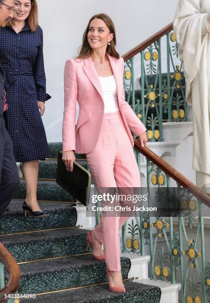 Catherine, Duchess Of Cambridge smiles as she departs after hosting a roundtable with Government ministers and the Early Years sector to mark the...