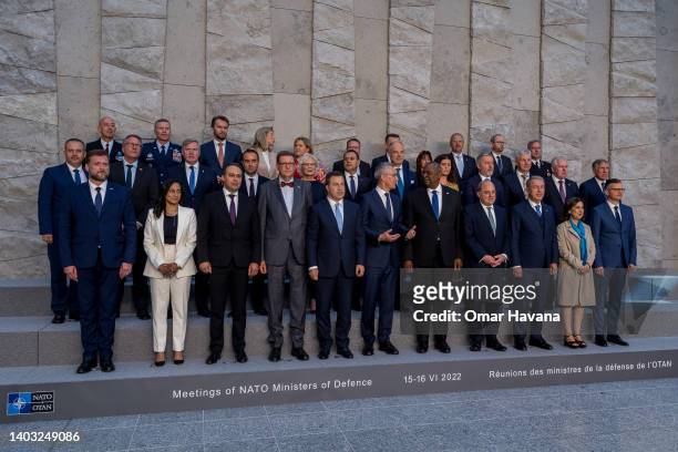 Defence ministers and senior NATO officials pose for the official press photo on the second day of the NATO defence ministers' meeting on June 16,...