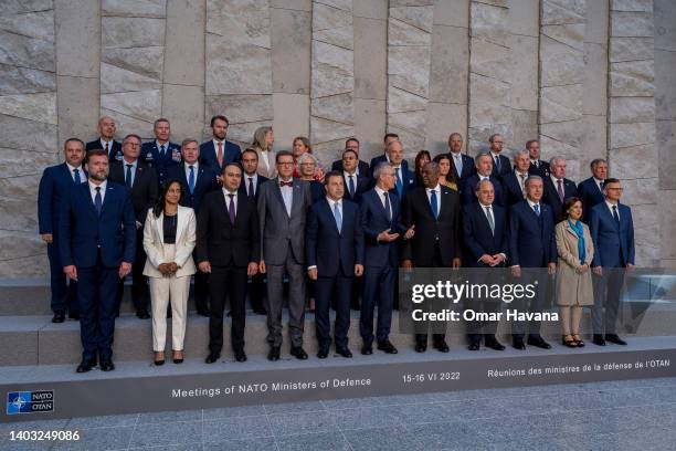 Defence ministers and senior NATO officials pose for the official press photo on the second day of the NATO defence ministers' meeting on June 16,...