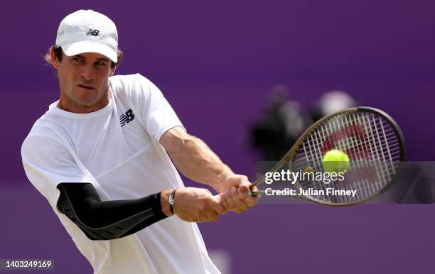 Tommy Paul of The United States plays a backhand against Stan Wawrinka of Switzerland during the Men's Singles Second Round match on day four of the...