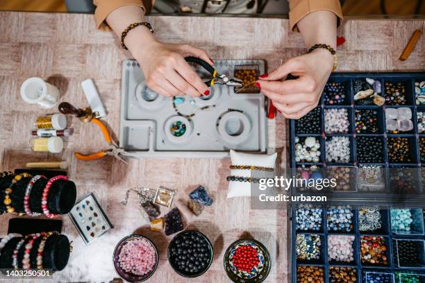 making jewelry with beads - jeweller tools stock pictures, royalty-free photos & images