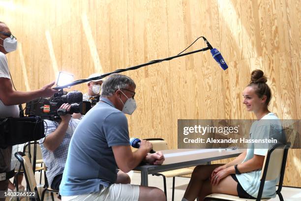 Lina Magull talks to the media during the media day of the German Women's national soccer team at Adi-Dassler-Stadion of adidas Herzo Base global...