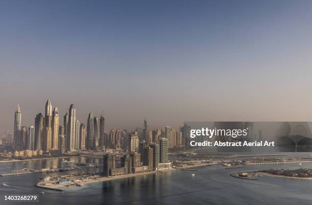 high angle view showing dubai marina on a sunny day, dubai, united arab emirates - golfe persique photos et images de collection