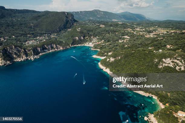 drone shot showing a bay on the coastline, corfu, greece - caractéristiques côtières photos et images de collection