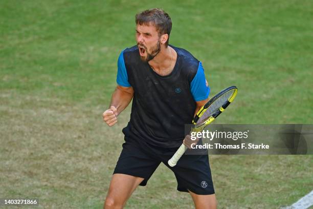 Oscar Otte of Germany celebrates winning his match against Nikoloz Basilashvili of Georgia during day six of the 29th Terra Wortmann Open at...