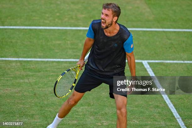 Oscar Otte of Germany celebrates winning his match against Nikoloz Basilashvili of Georgia during day six of the 29th Terra Wortmann Open at...