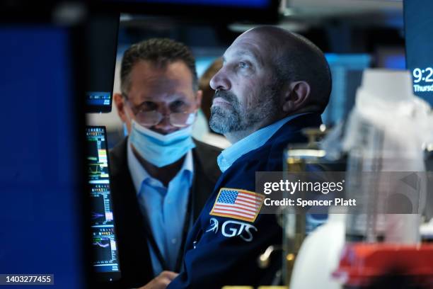 Traders work on the floor of the New York Stock Exchange on June 16, 2022 in New York City. Stocks fell sharply in morning trading as investors react...