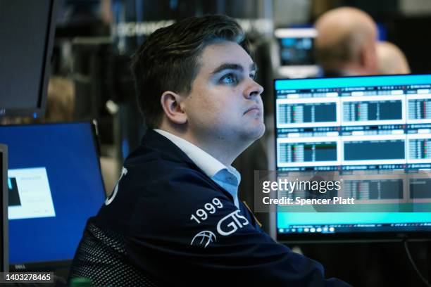 Traders work on the floor of the New York Stock Exchange on June 16, 2022 in New York City. Stocks fell sharply in morning trading as investors react...
