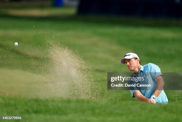 Russell Henley of The United States plays his third shot on the 15th hole during the first round of the 2022 U.S.Open Championship at The Country...